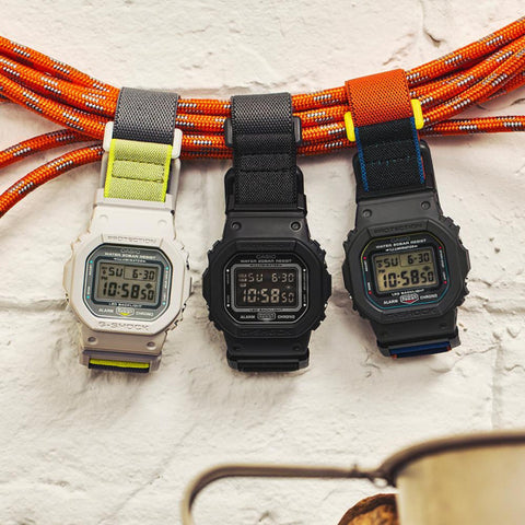 G-SHOCK DW-5600MNC-7A8ER – Montre Gris Clair Jaune Fluo Bracelet FIDLOCK®